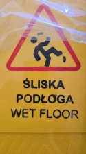 Tablica ostrzegawcza dwustronna żółta potykacz uwaga śliska podłoga OUTLET